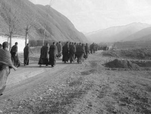 Monks walking to Dorje Rinchen’s home to offer prayers after his self-immolation. October 2012. | Photo: savetibet.org